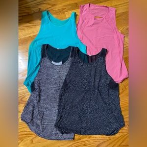 4 Lulu lemon sculpt tanks